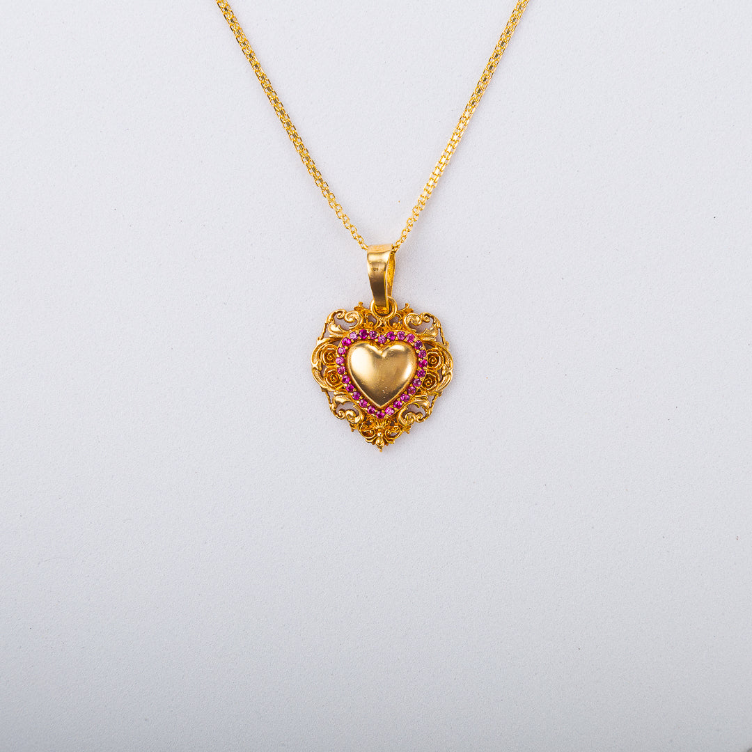 Dije en oro 18k con arabescos y rubies